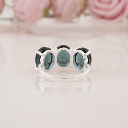 Elegant Lab-Grown Oval Shape Blue Topaz Three Stone Ring