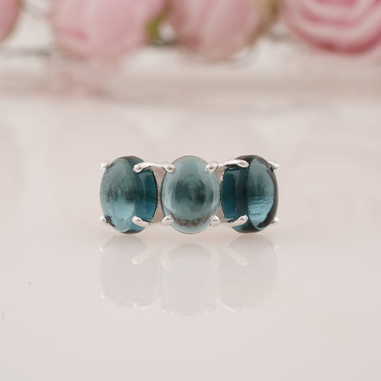 Elegant Lab-Grown Oval Shape Blue Topaz Three Stone Ring