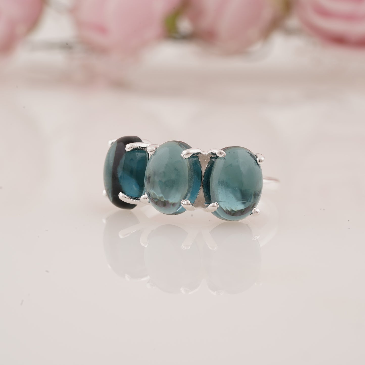 Elegant Lab-Grown Oval Shape Blue Topaz Three Stone Ring