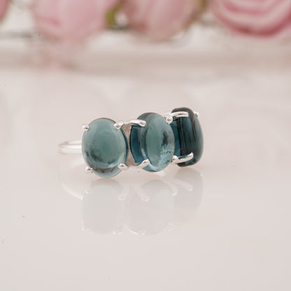 Elegant Lab-Grown Oval Shape Blue Topaz Three Stone Ring