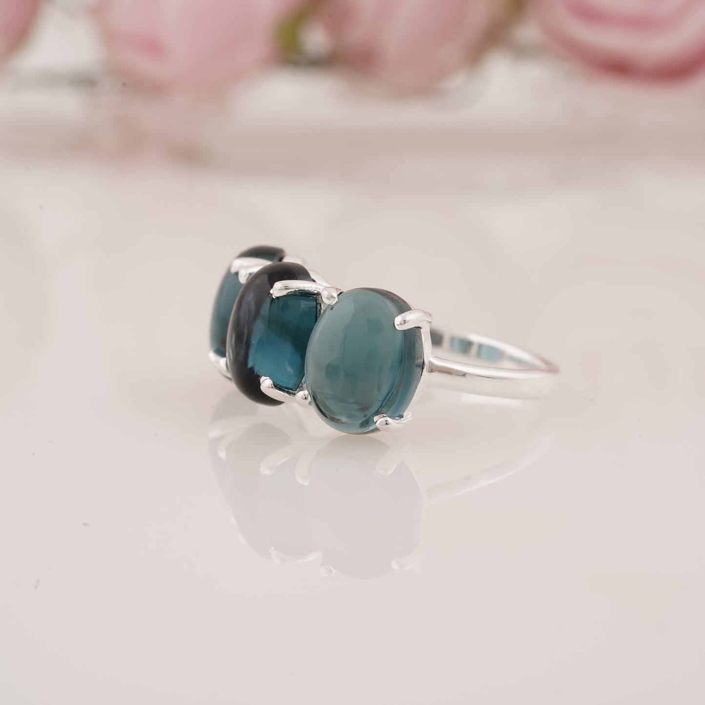 Elegant Lab-Grown Oval Shape Blue Topaz Three Stone Ring
